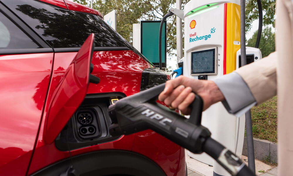 Electric plug connected and charging a vehicle