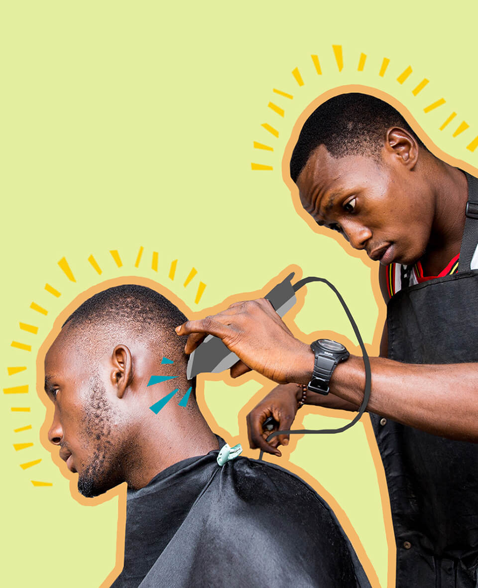 Man getting a haircut with electric clippers