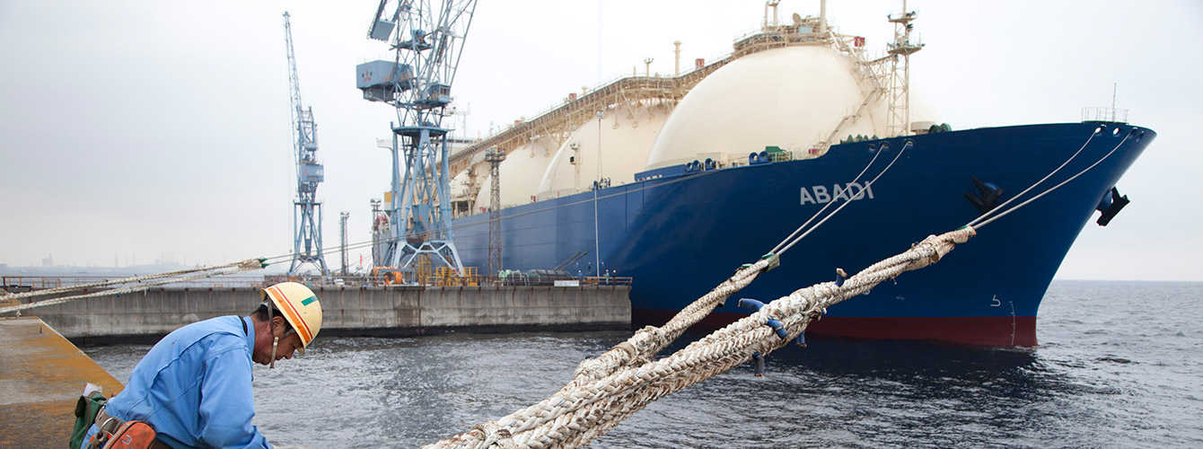 Male worker with LNG ship, Japan